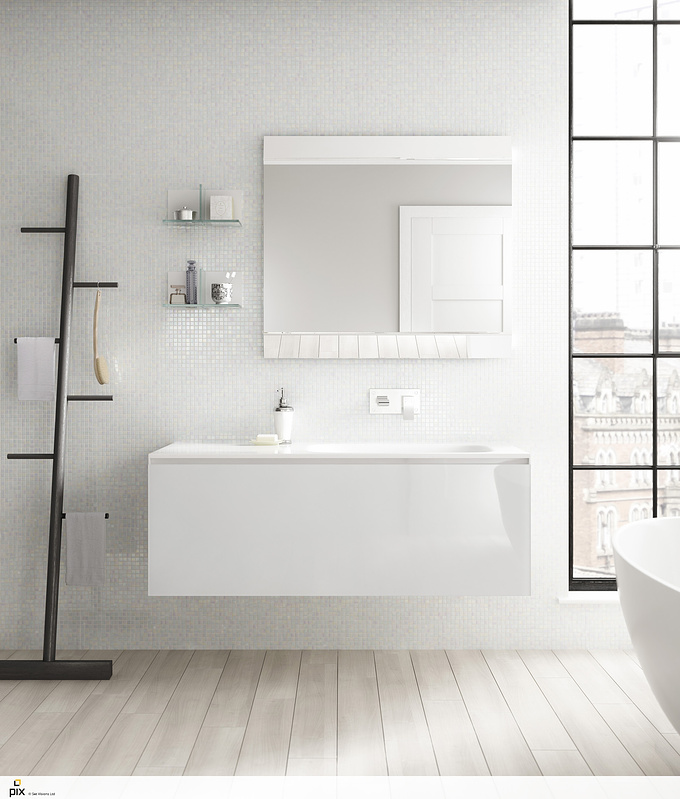 Modern converted mill bathroom with white lustre tiles contrasting against smooth white gloss vanity unit. Black mill window and ladder balances the image