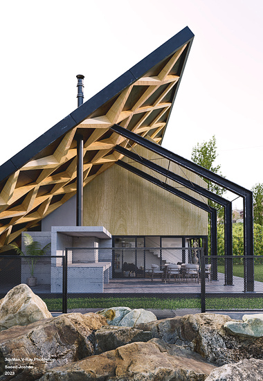 Superhelix House behind roof