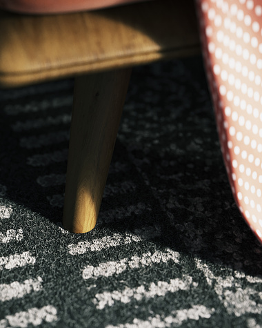 detail of carpet and wood
