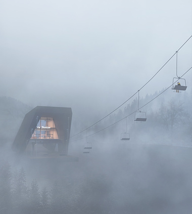 Chair lift in a foggy morning