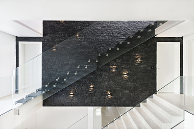 Stuctural glass staircase with black glass treads