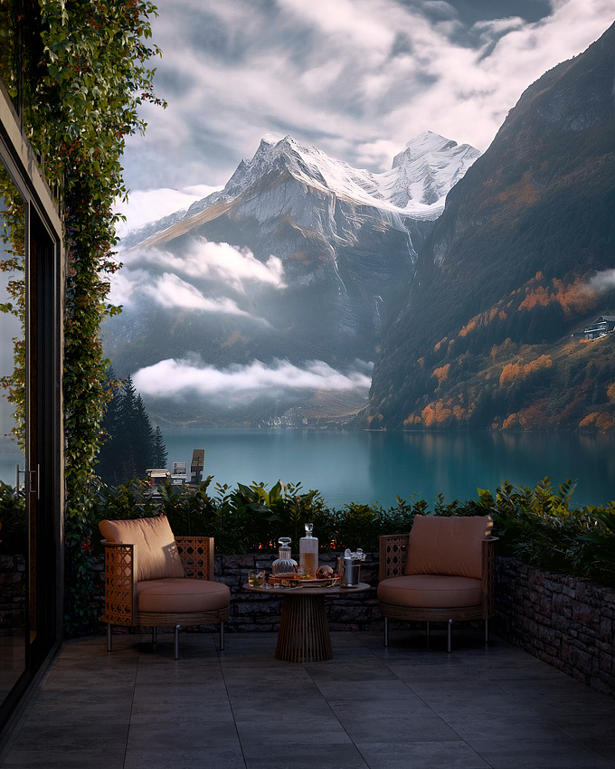 A balcony with a view of snow-capped mountains.